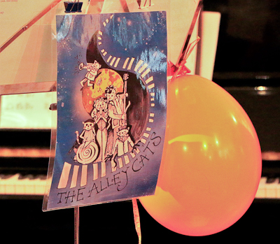 Alley Cats sign and balloon