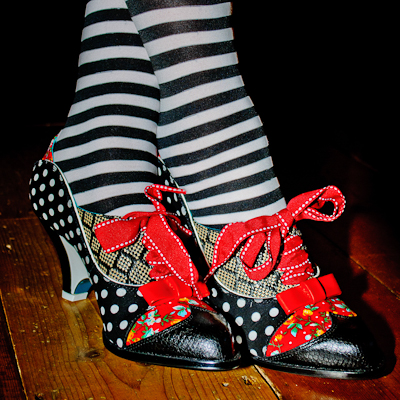 Stripy socks and shoes with red bows